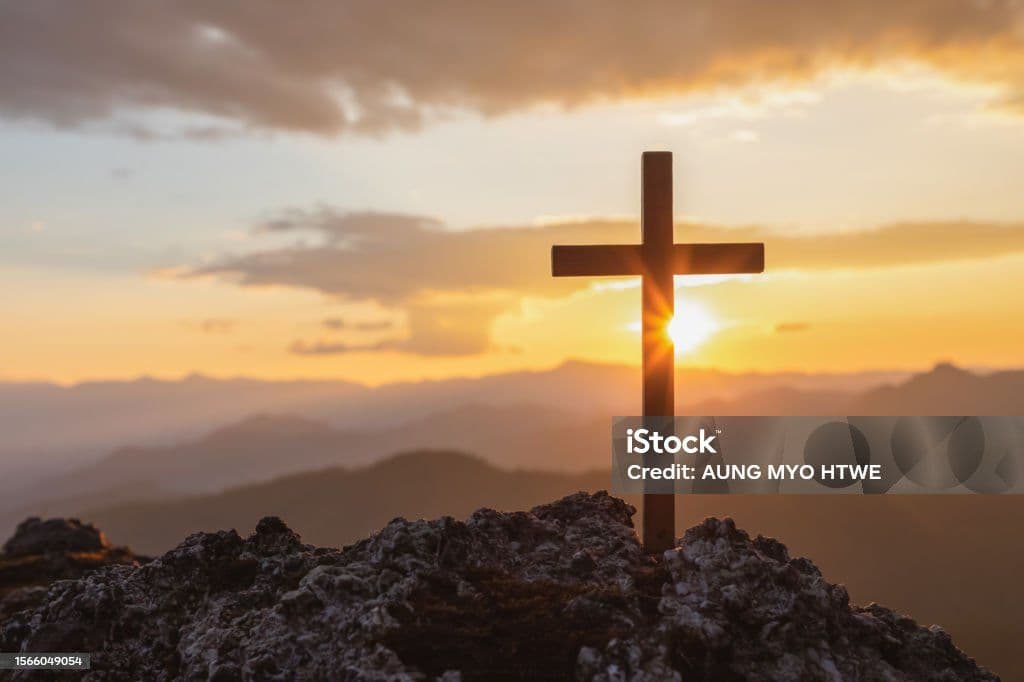 cross on top of mountain